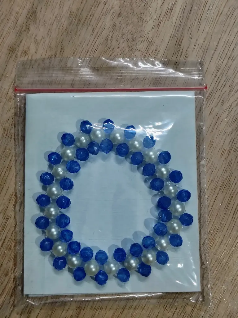 Blue and white pearl braided bracelet