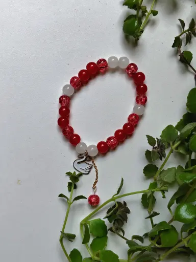 White and red charm bracelet