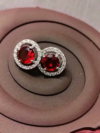 Red colour American diamond studs