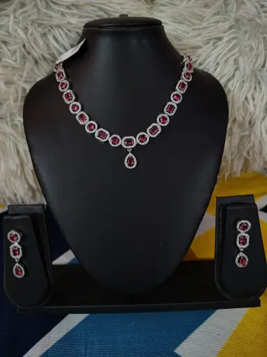 Peach colour American diamond jewellery