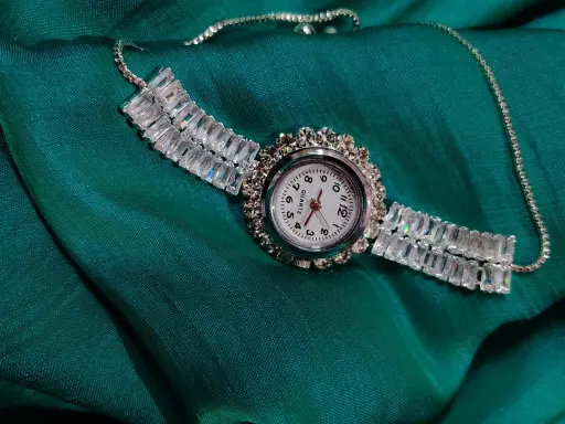 White colour American diamond bracelet com watch
